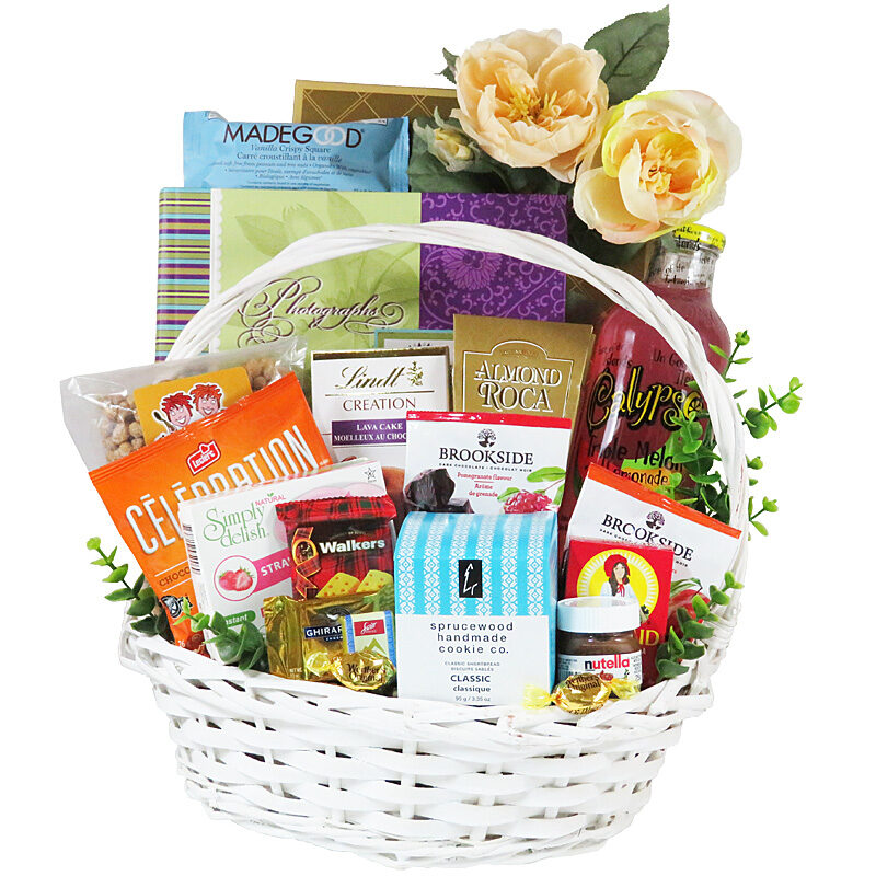Sweet Memories gift basket with a nice photo album and delectable sweets.